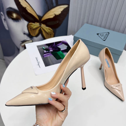 PRADA 26S POINTED TOE PUMPS STILETTO HEEL 95MM IN NUDE BEIGE PATENT CALFSKIN LOGO