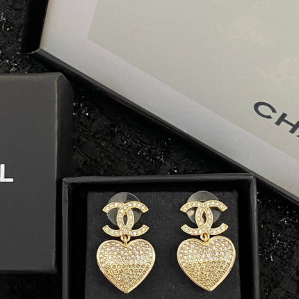 CHANEL 26S DOUBLE C LOGO PAVE CRYSTAL HEART DROP EARRINGS IN GOLD METAL 633109