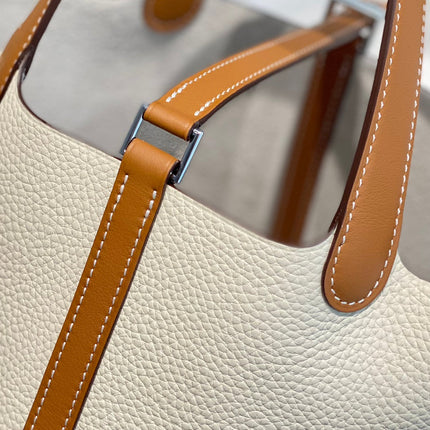 HERMES 25S PICOTIN LOCK 18 IN BURNT ORANGE AND IVORY CALFSKIN SILVER HARDWARE