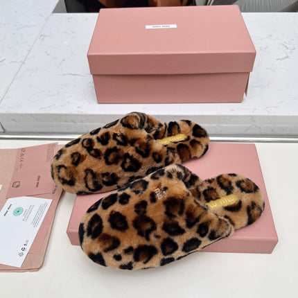 MIUMIU 26S MULES IN LEOPARD PATTERN SHEARLING 