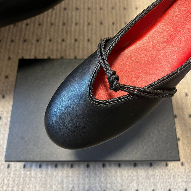 BOTTEGA VENETA 26S FLAT MULES IN BLACK LAMBSKIN