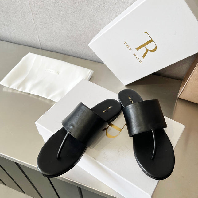 THE ROW 26S FLAT THONG SANDALS IN BLACK CALFSKIN
