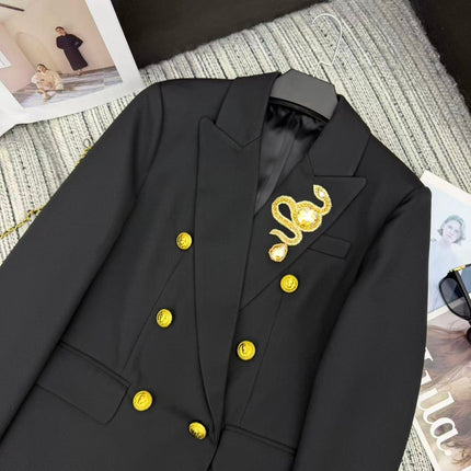 LONG COAT IN BLACK WITH GOLD BUTTONS AND A SNAKE BROOCH