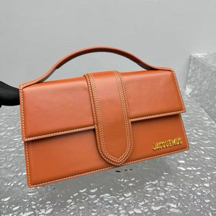 JACQUEMUS 26S LE BAMBINOHANDLE BAG IN BRICK ORANGE CALFSKIN