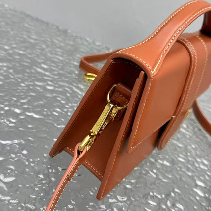 JACQUEMUS 26S LE BAMBINOHANDLE BAG IN BRICK ORANGE CALFSKIN