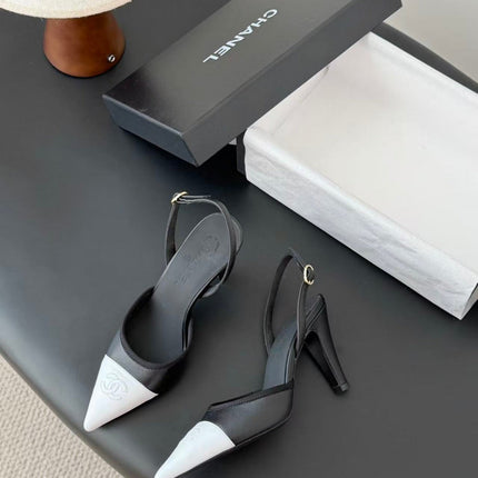 CHANEL POINTED TOE SLINGBACK PUMPS IN BLACK AND WHITE CALFSKIN