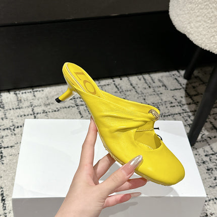 CHLOÉ 26S HIGH-HEELED MULES IN YELLOW CALFSKIN