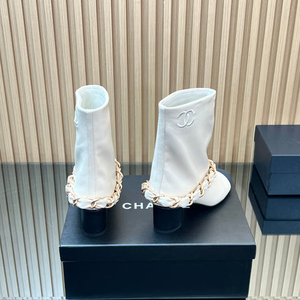CHANEL 25S LOW BOOTS 65MM IN WHITE CALFSKIN GOLD HARDWARE