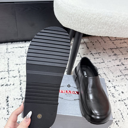 PRADA 26S SLIP ON SHOES IN BLACK SMOOTH CALFSKIN
