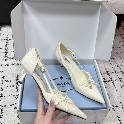 PRADA 26S POINTED-TOE HIGH HEELS 55MM IN IVORY WHITE CALFSKIN WITH BOW