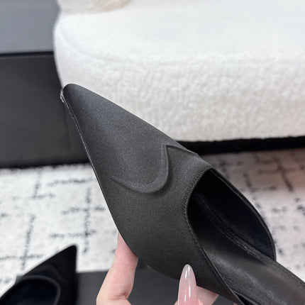 ALAIA 26S HEELED MULES 65 MM IN BLACK SATIN