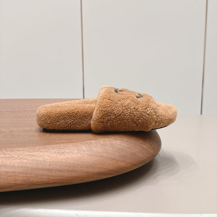 CHANEL 26S SLIDE MULES IN BROWN SHEARLING AND BLACK CC LOGO