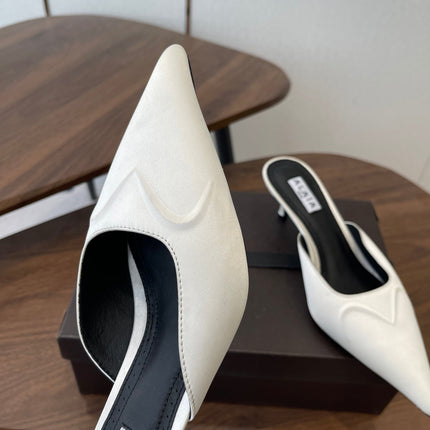 ALAIA 26S HEELED MULES 50 MM IN WHITE FABRIC