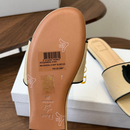 DIOR 26S D-BADGE FLAT SLIDE SANDALS IN BEIGE CANVAS AND BLACK CALFSKIN