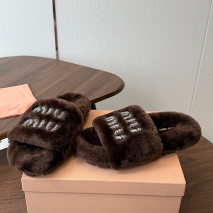 MIUMIU 26S CRYSTAL LOGO SLIDES IN DARK BROWN SHEARLING