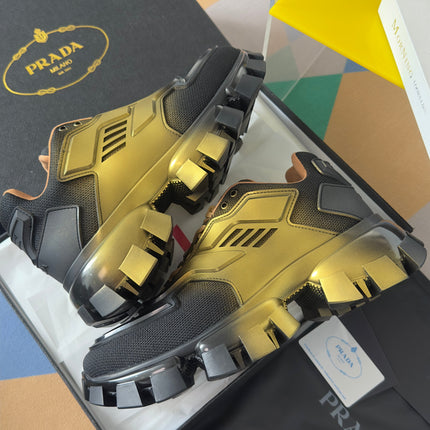PRADA 26S CLOUDBUST THUNDER SNEAKERS 60MM IN BLACK AND GOLD MESH FABRIC AND TPU
