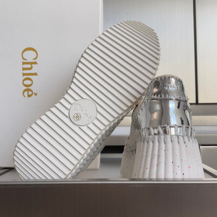 CHLOÉ 26S WEDGE SNEAKERS 70 MM IN WHITE AND SILVER CALFSKIN