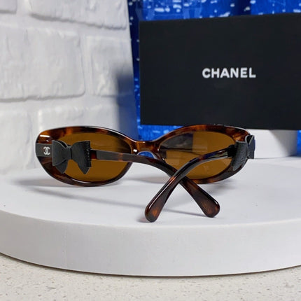 CHANEL 26S SLIM OVAL FRAME IN BROWN ACETATE 404787