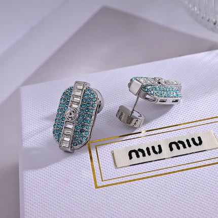 MIUMIU 26S CRYSTAL OVAL STUD EARRINGS IN TURQUOISE AND CLEAR STONES IN SILVER TONE METAL 626875