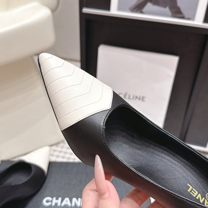 CHANEL 26S HIGH HEELS IN BLACK LAMBSKIN WITH WHITE CHEVRON-QUILTED TOE