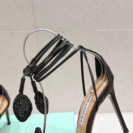AQUAZZURA 26S FLORAL HEELS 100 MM IN BLACK WOVEN RAFFIA