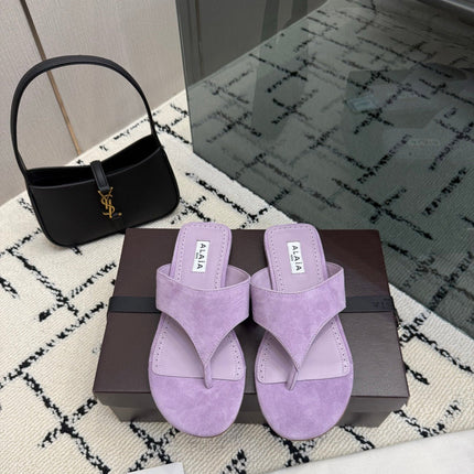 ALAIA 26S THONG MULE SANDALS IN PURPLE SUEDE