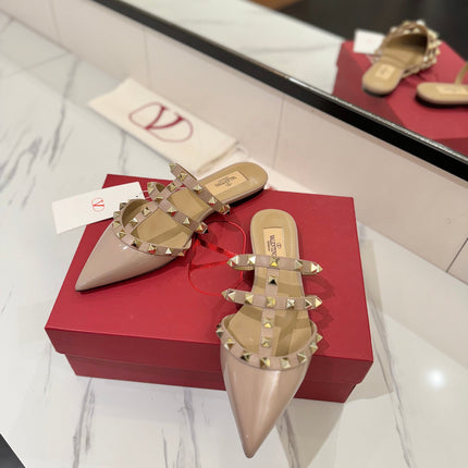 VALENTINO 26S STUDDED FLAT MULES IN NUDE PATENT CALFSKIN