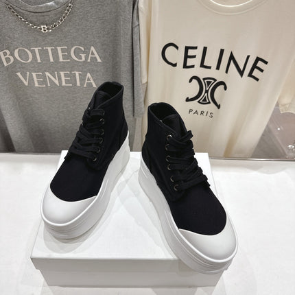 CELINE 26S BOOTS IN WHITE AND BLACK CANVAS