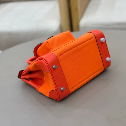 HM 25S BIRKIN CARGO 25 CM IN DARK ORANGE CANVAS AND SWIFT WITH SILVER HARDWARE