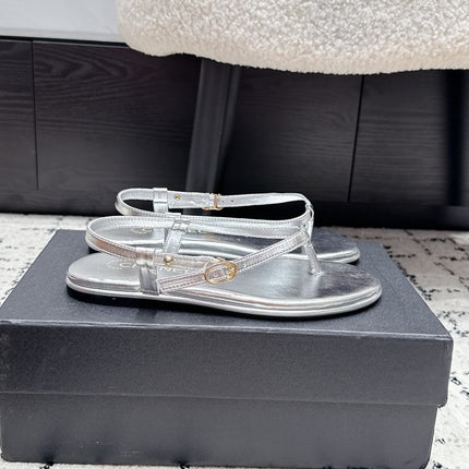 CHANEL 26S THONG SANDALS IN SILVER CALFSKIN WITH GOLD HARDWARE