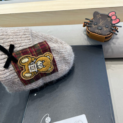 BEANIE HAT IN CAMEL BEIGE WOOL WITH BOW 421255