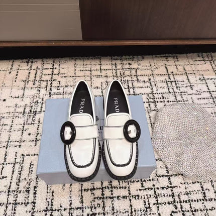 PRADA 26S BUCKLED LOAFERS IN WHITE CALFSKIN