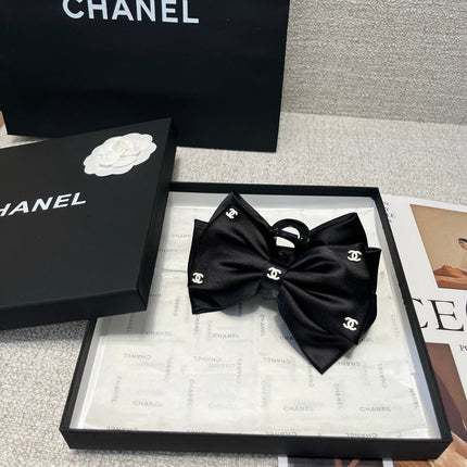 CHANEL 26S BOW HAIR CLIP IN BLACK RIBBON 512128