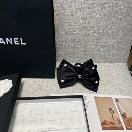 CHANEL 26S BOW HAIR CLIP IN BLACK RIBBON 512128