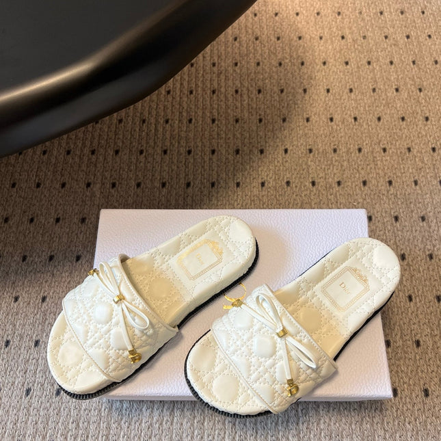 DIOR 26S SLIDES IN WHITE CALFSKIN WITH BOW