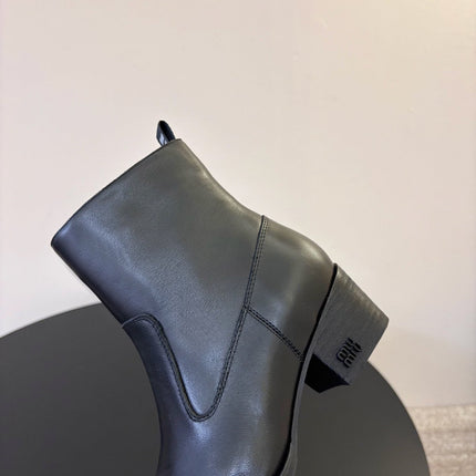 MIUMIU 26S WESTERN ANKLE BOOTS IN BLACK CALFSKIN