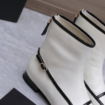 CHANEL 26S ANKLE BOOTS IN WHITE CALFSKIN WITH BLACK PATENT LEATHER TRIM AND CC LOGO ON TOE CAP