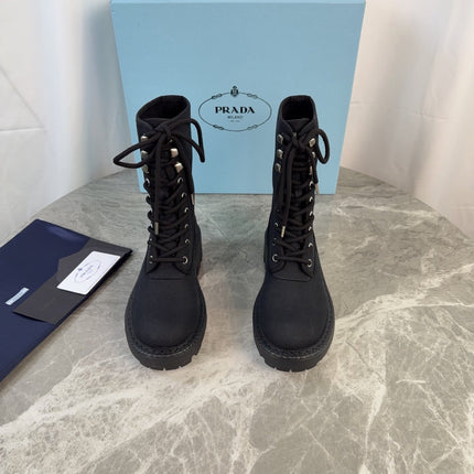 PRADA 26S LACE-UP COMBAT BOOTS IN BLACK CANVAS