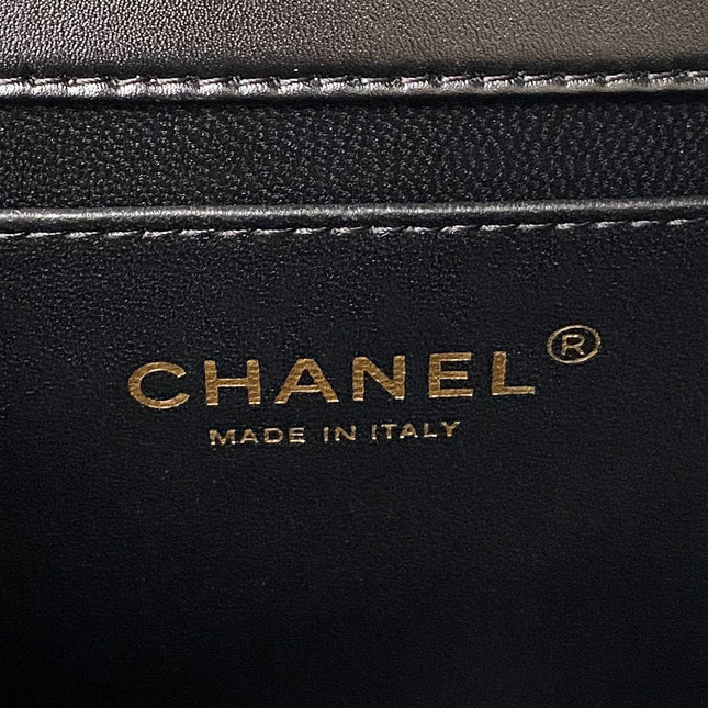 FLAP BAG 22 IN BLACK CALFSKIN WITH DOUBLE GOLD BALL