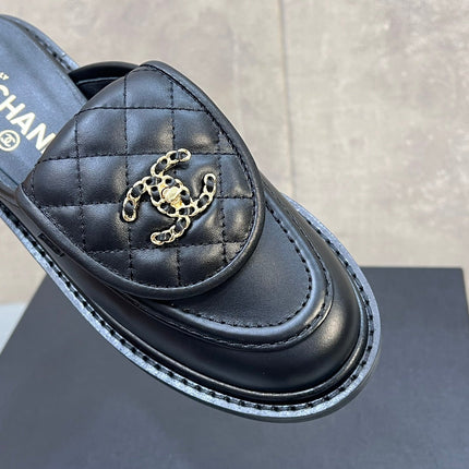 CHANEL 26S MULE LOAFERS IN BLACK QUILTED CALFSKIN WITH CC LOGO