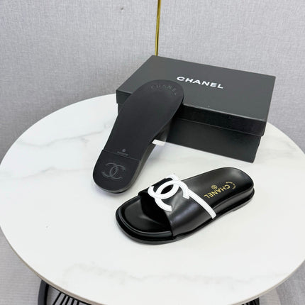 CHANEL 26S ICONIC CC SLIDES IN BLACK LAMBSKIN