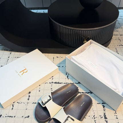 THE ROW 26S BUCKLE SLIDE SANDALS IN WHITE CALFSKIN