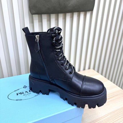 PRADA 25S MONOLITH BOOTS IN BLACK CALFSKIN