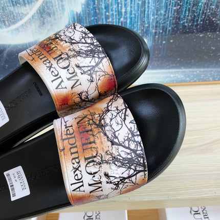 SLIDES SANDAL IN BLACK TPU ORANGE BAND BLACK BRANCH STRAP