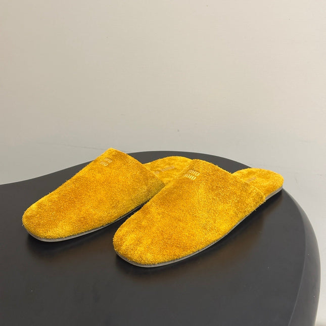 MIUMIU 26S MULE LOAFERS IN OCHRE YELLOW SUEDE LOGO