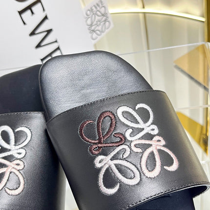 LOEWE 26S LOGO-EMBROIDERED SANDALS IN BLACK CALFSKIN