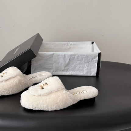 CHANEL 26S MULES IN WHITE SHEARLING LINING