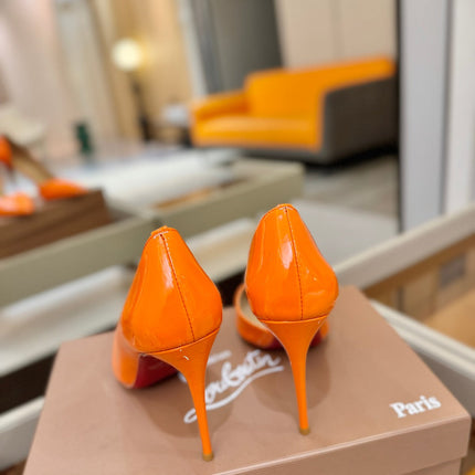 CHRISTIAN LOUBOUTIN 26S CUTOUT SIDE PUMP HEELS 105 MM IN ORANGE PATENT CALFSKIN