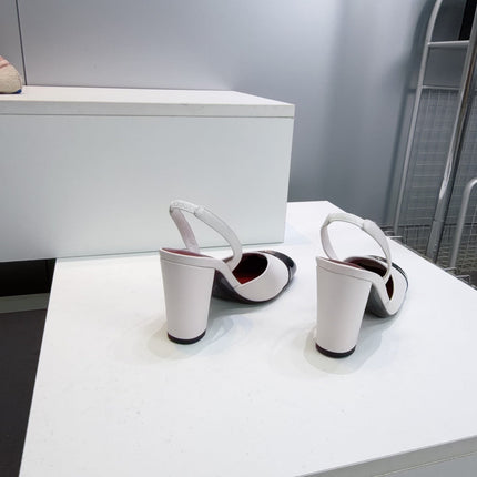 CHANEL 26S SLINGBACK 95 MM IN WHITE LAMBSKIN WITH BLACK CAP TOE