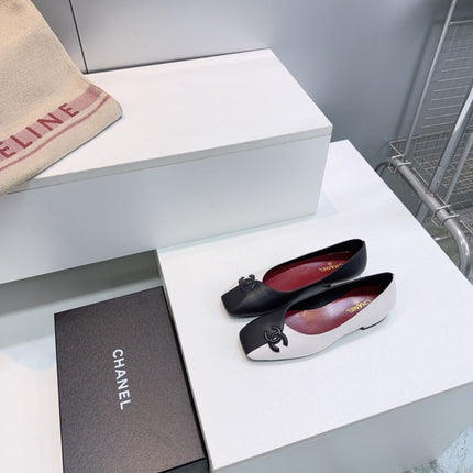 CHANEL 26S SQUARE-TOE FLATS IN BLACK AND WHITE LAMBSKIN